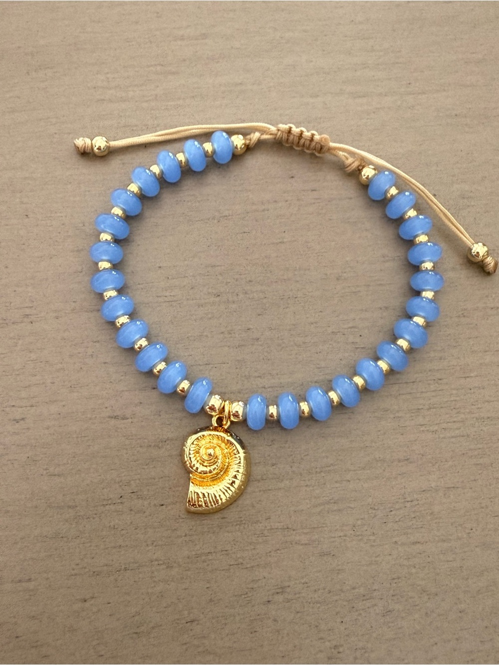 Blue Beaded Bracelet with Gold Shell Charm